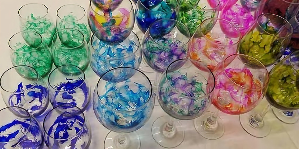 Several wine glasses customized with alcohol ink.